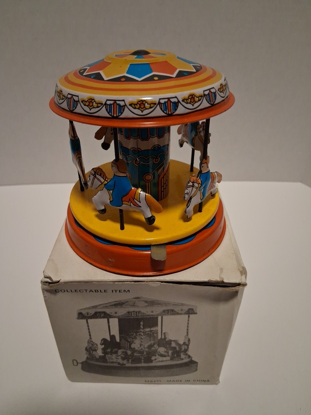 Reproduction ~ Vintage Metal Push and Spin CAROUSEL With Horses And Children