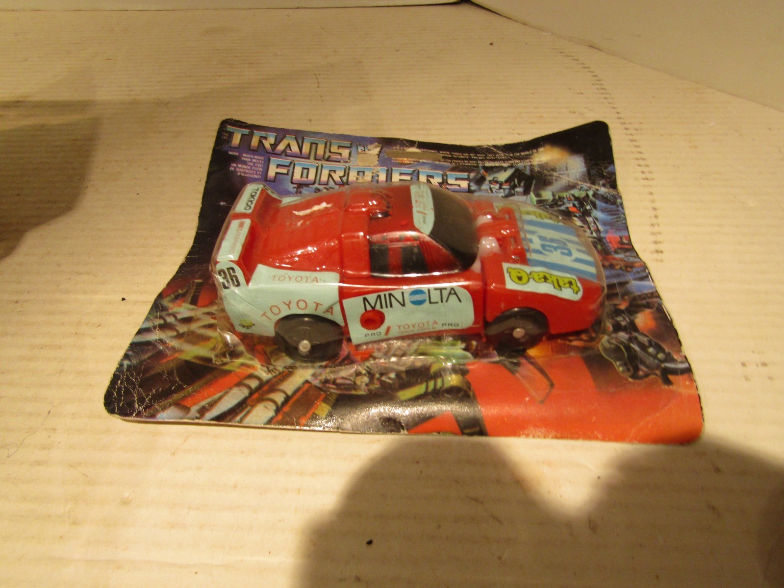 VINTAGE PLASTIC TOY CAR TRANSFORMERS REPRODUCTION KNOCKOFF CAR MADE IN JAPAN