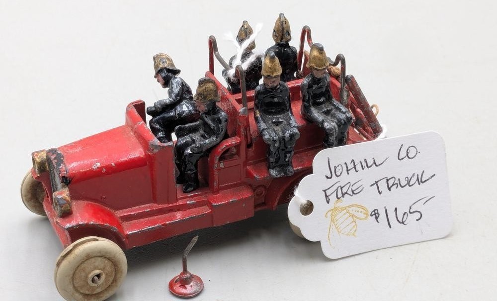 Vintage Johill Co. pre-war toy fire engine with fireman figures