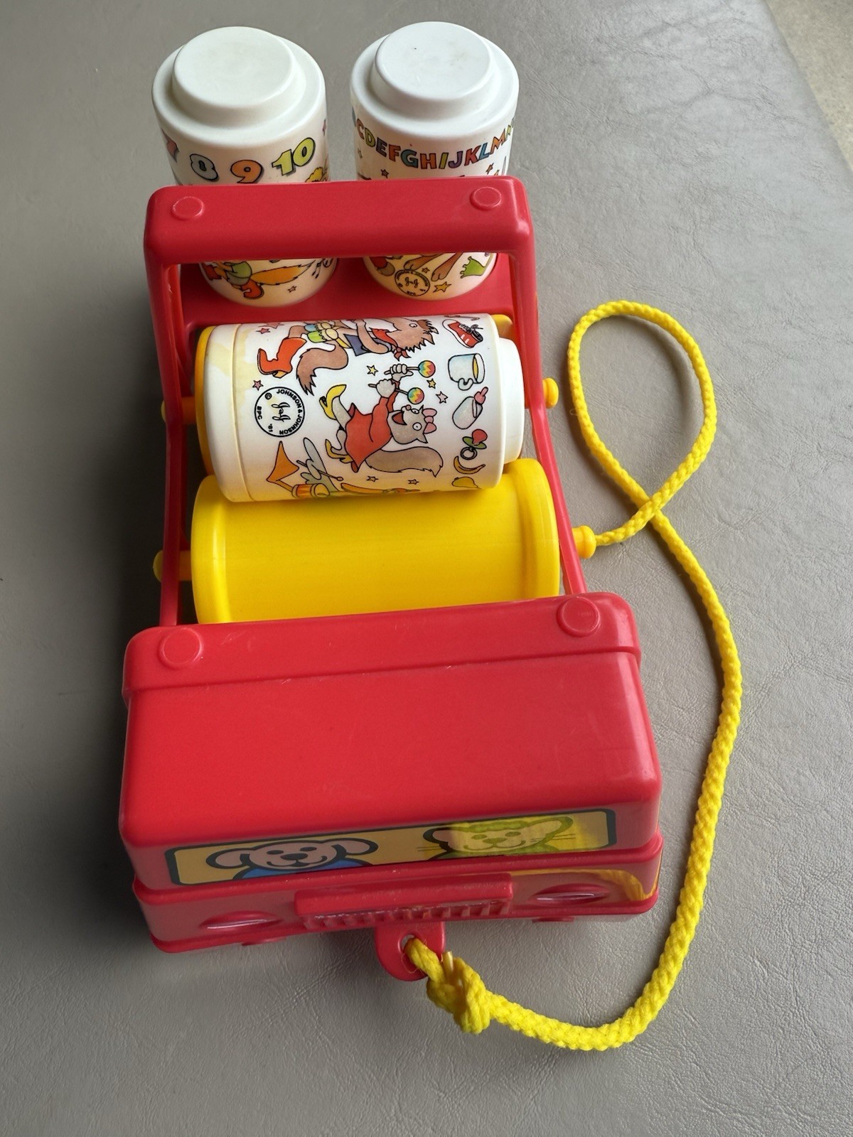 Vintage Johnson & Johnson Rhythm Roller Red Truck 3 Rattle Rollers Plastic 1982