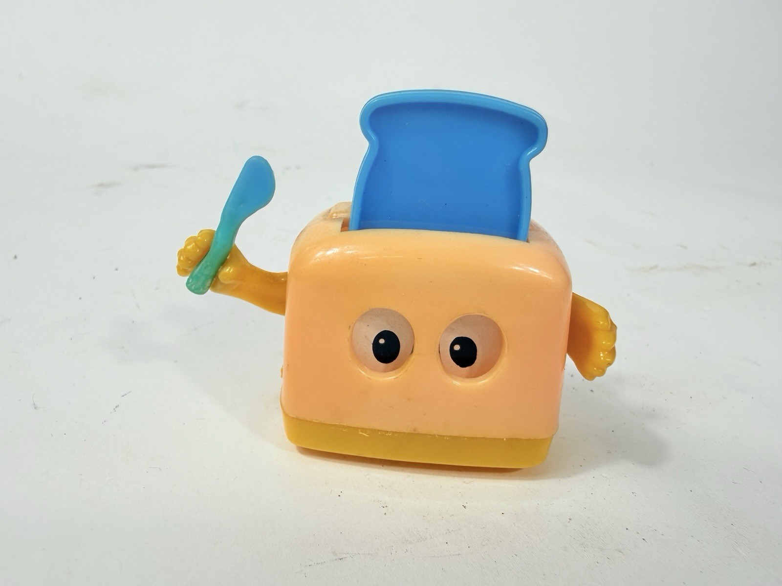 Vintage TOMY TOASTER WIND-UP TOY MADE IN SINGAPORE plastic