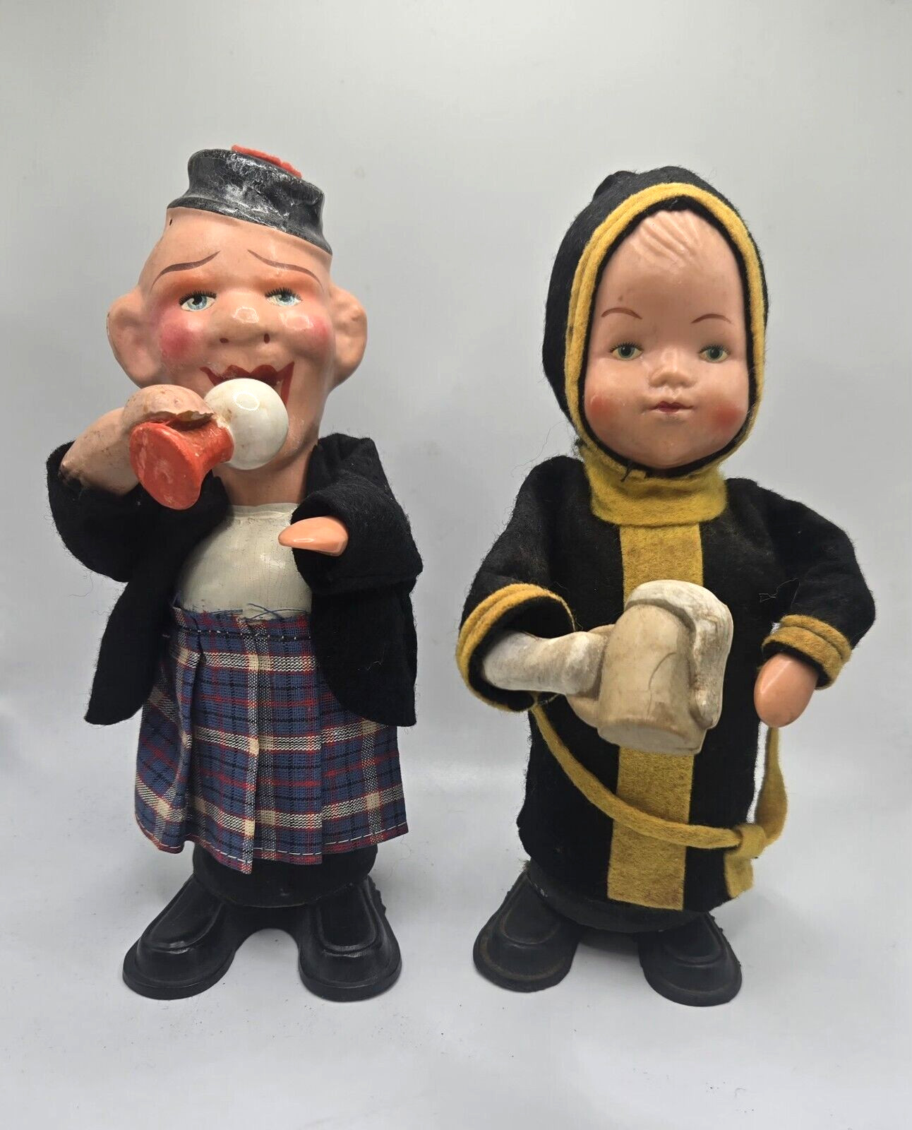 Vintage 1940’s (?) Rolly Toys German Drinking Man & Girl Spring Body & Arm