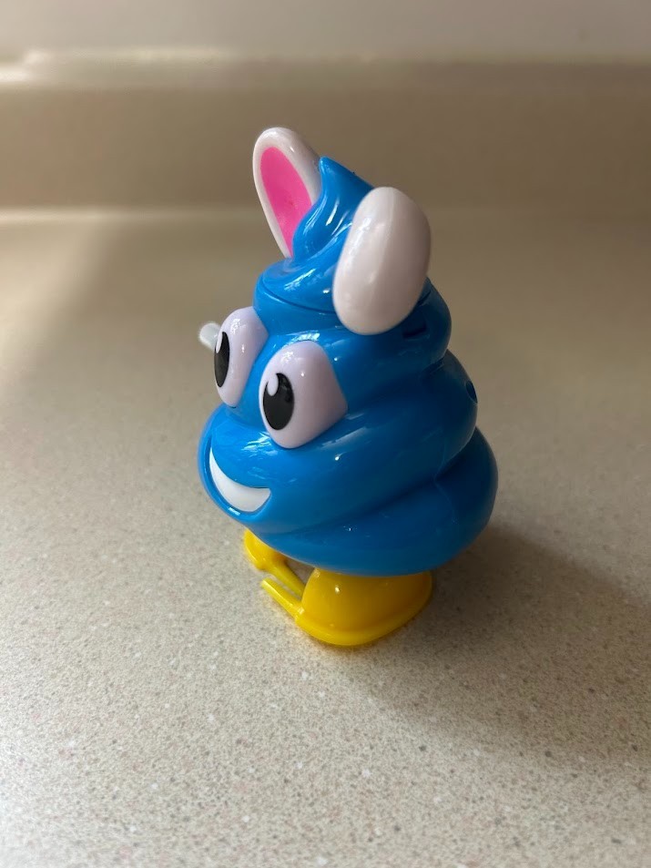 Flix OH Poop Wind Up Candy Dispenser Blue Bunny Smiling Emoji