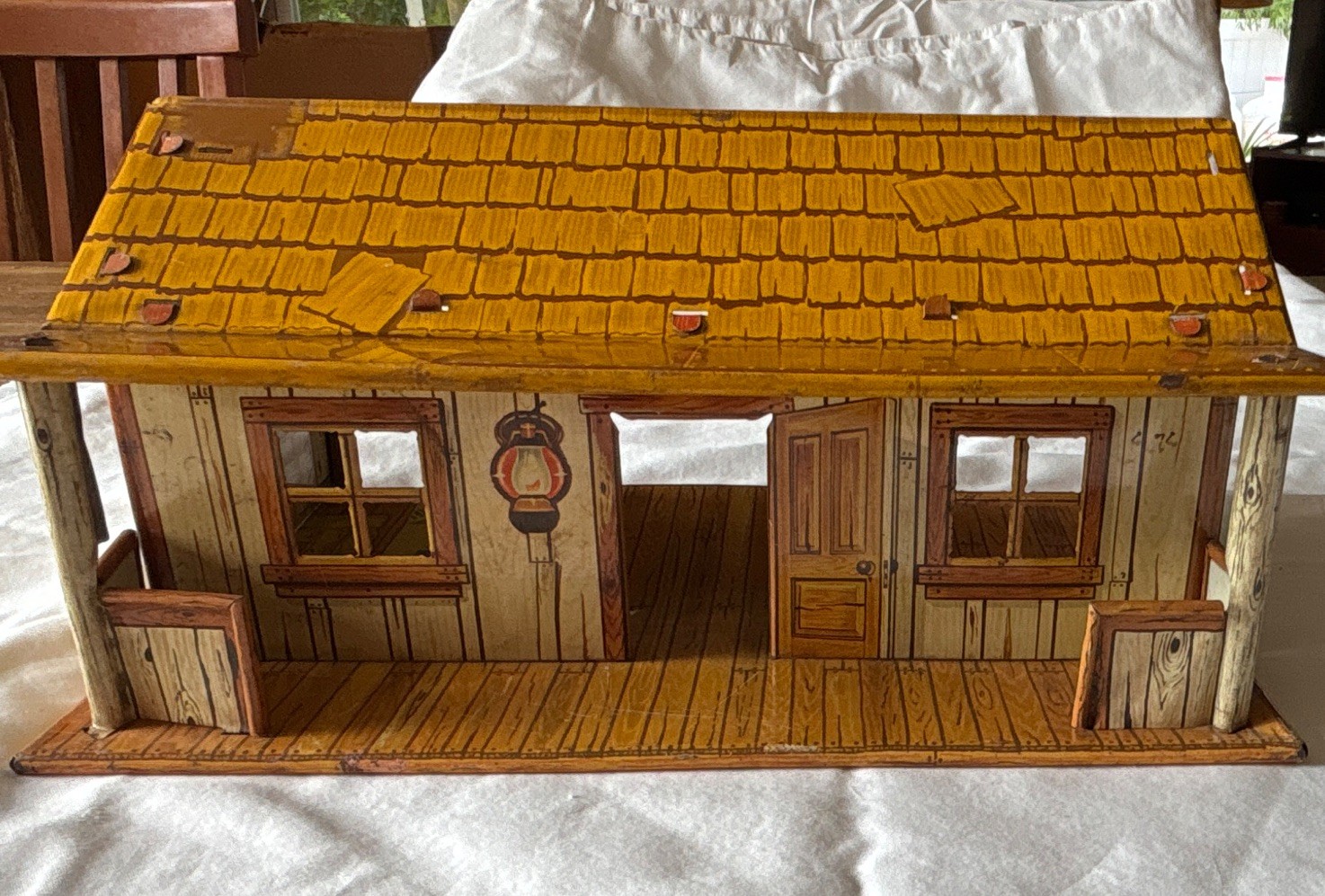Vintage Marx Bar M Ranch log cabin. Missing chimney, some dents and scratches