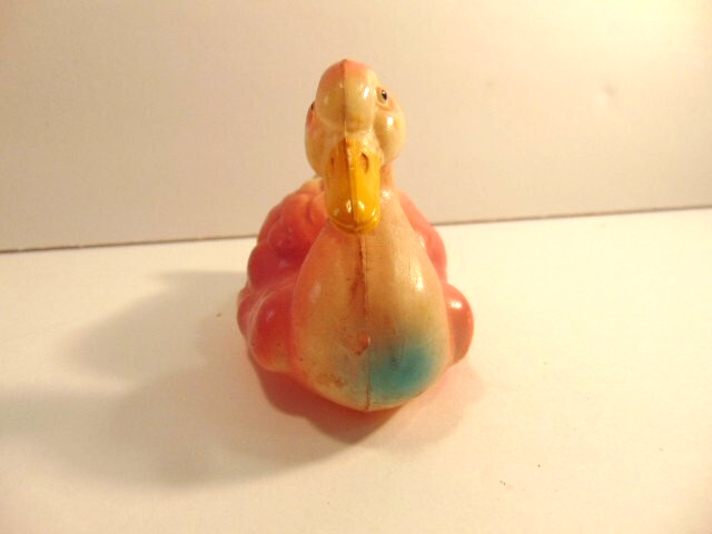 small vintage pinkish celluloid duck (about 4 inches long)