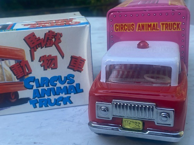 Circus Animal Truck with Moving Lion Tin Friction Toy new in box, vintage.