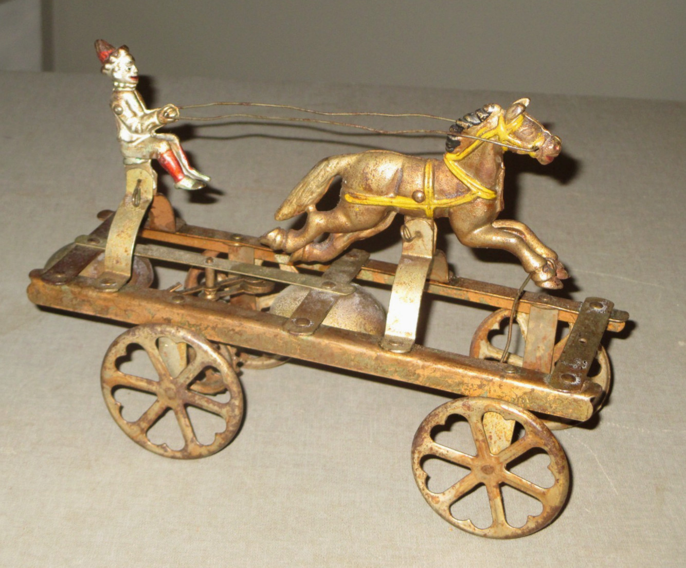 1900’S ANTIQUE PULL BELL TOY- WATROUS- CLOWN ON CART-HORSE- CAST IRON- ORG 10″