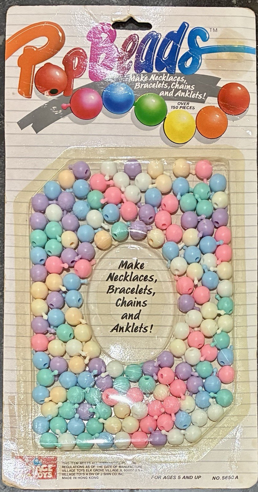 Vintage 1970s / 1980s package of “Pop Beads” by Village Toys NIP