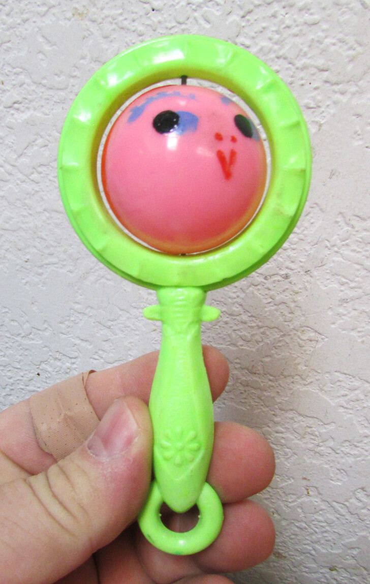 vintage 1940s Celluoid green Baby Rattle toy Unusual spinning Middle w 2 faces