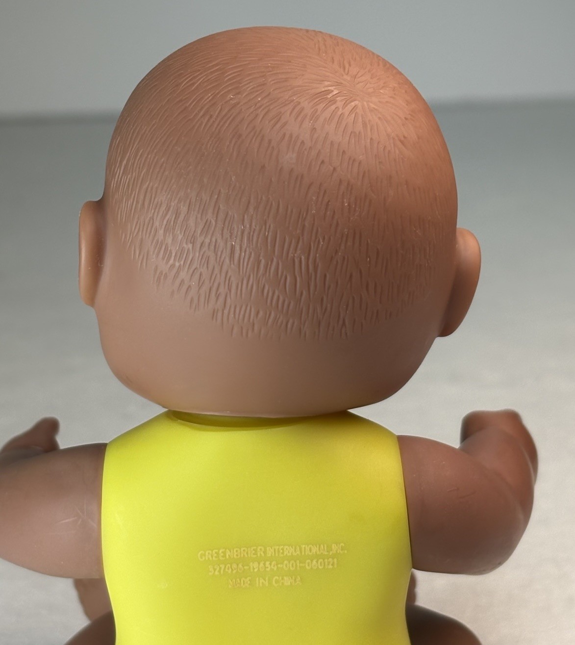 VTG Greenbrier International Baby Doll 7” Brown Vinyl Body w/ Yellow Bodysuit