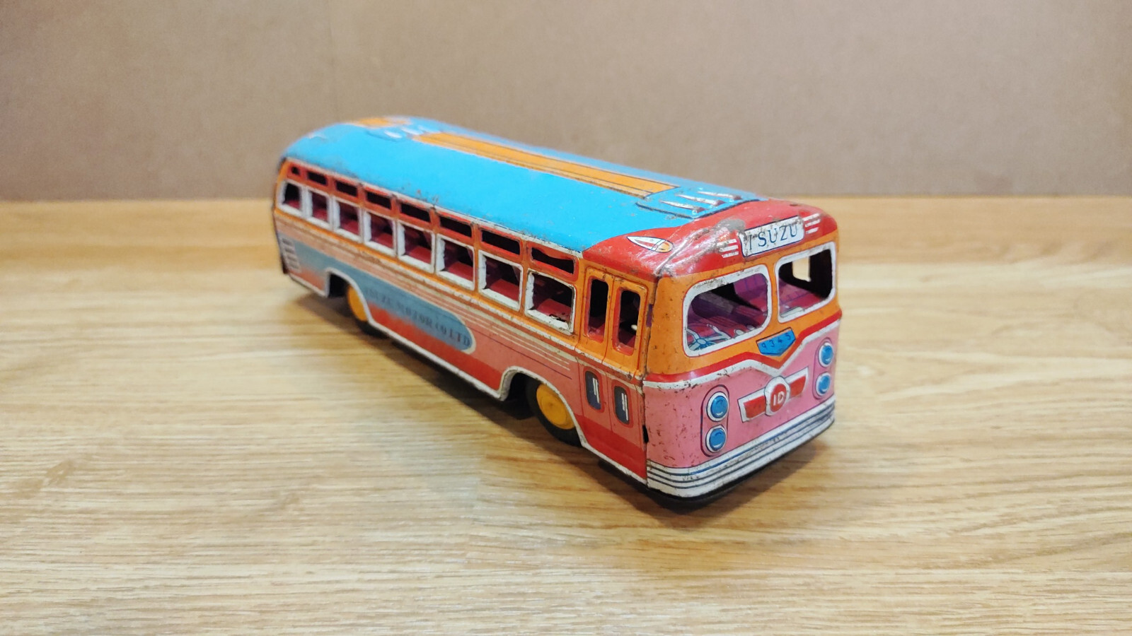 Vintage retro bus litho tin toy Japan Isuzu Motor CoLtd Bus tin friction powered
