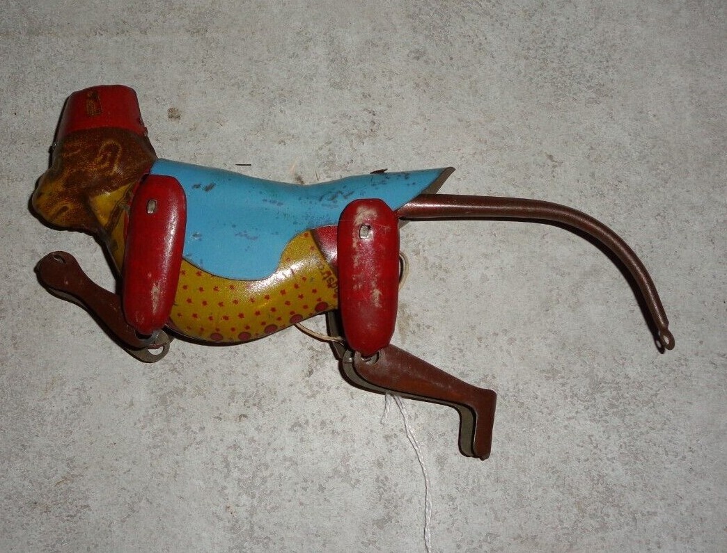 ANTIQUE LINDSTROM TOOL & TOY CO. CLIMBONG MONKEY NO. 114 TIN TOY