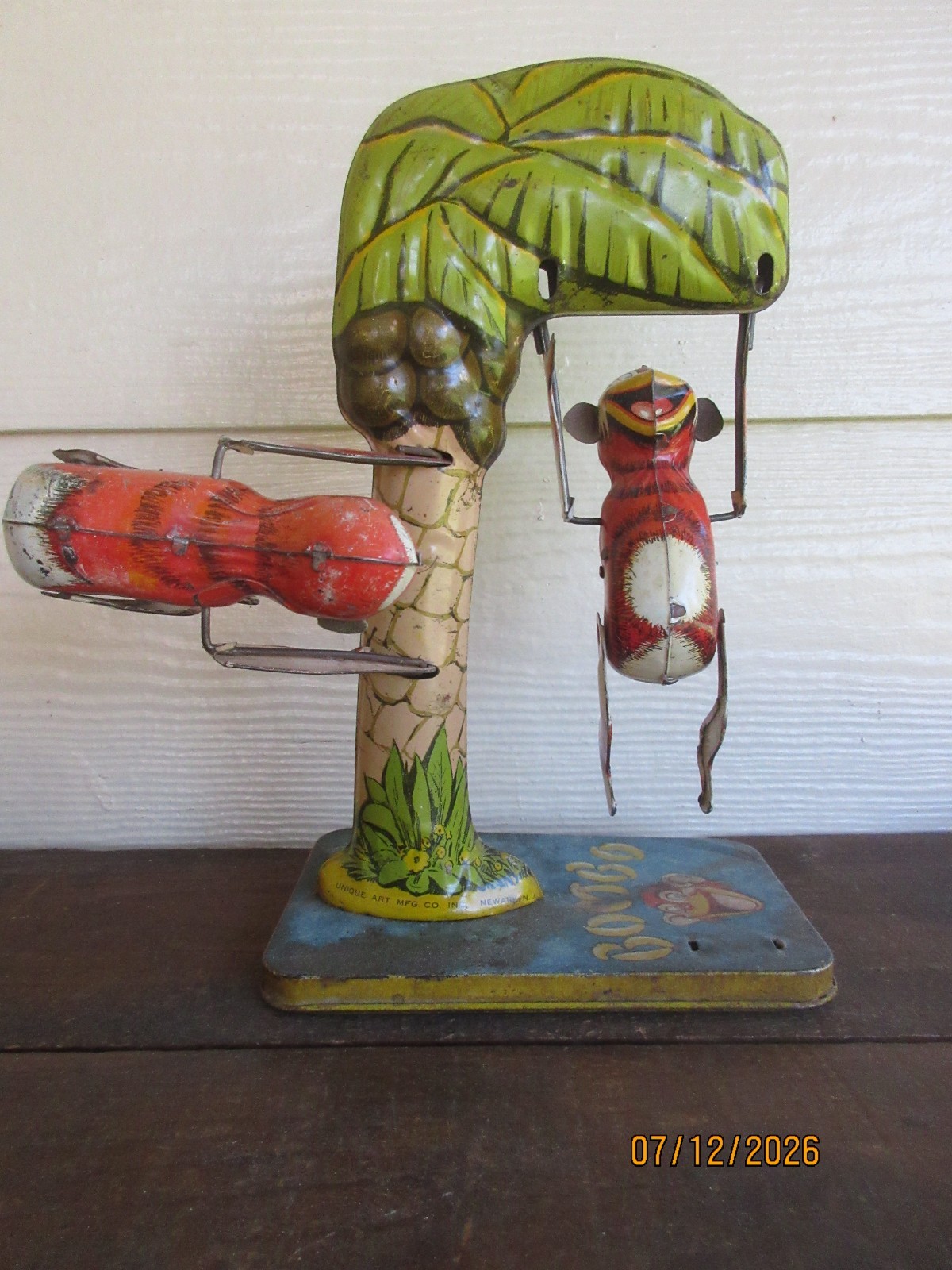 1950’s Unique Art “Bombo” Swinging Monkey Tin Litho Wind-up Toy with Key Works!