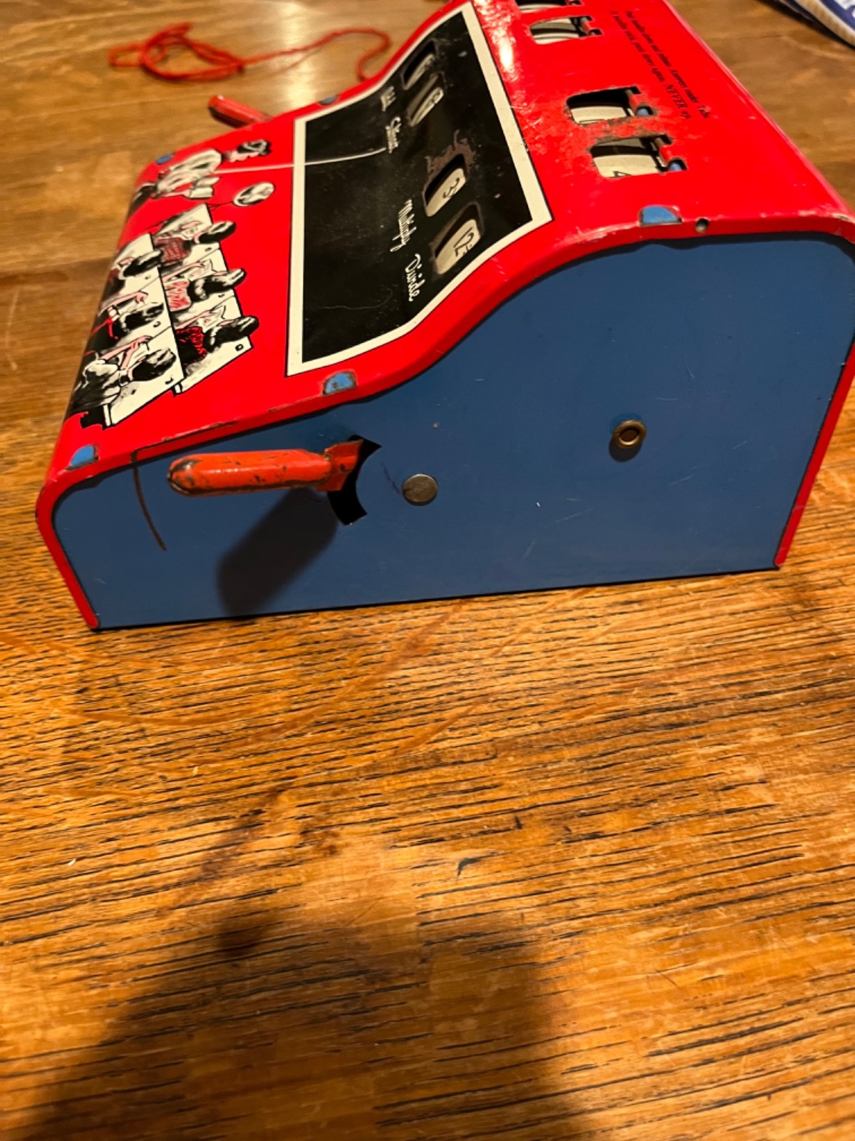 vintage Wolverine Arithmetic Quiz tin toy.