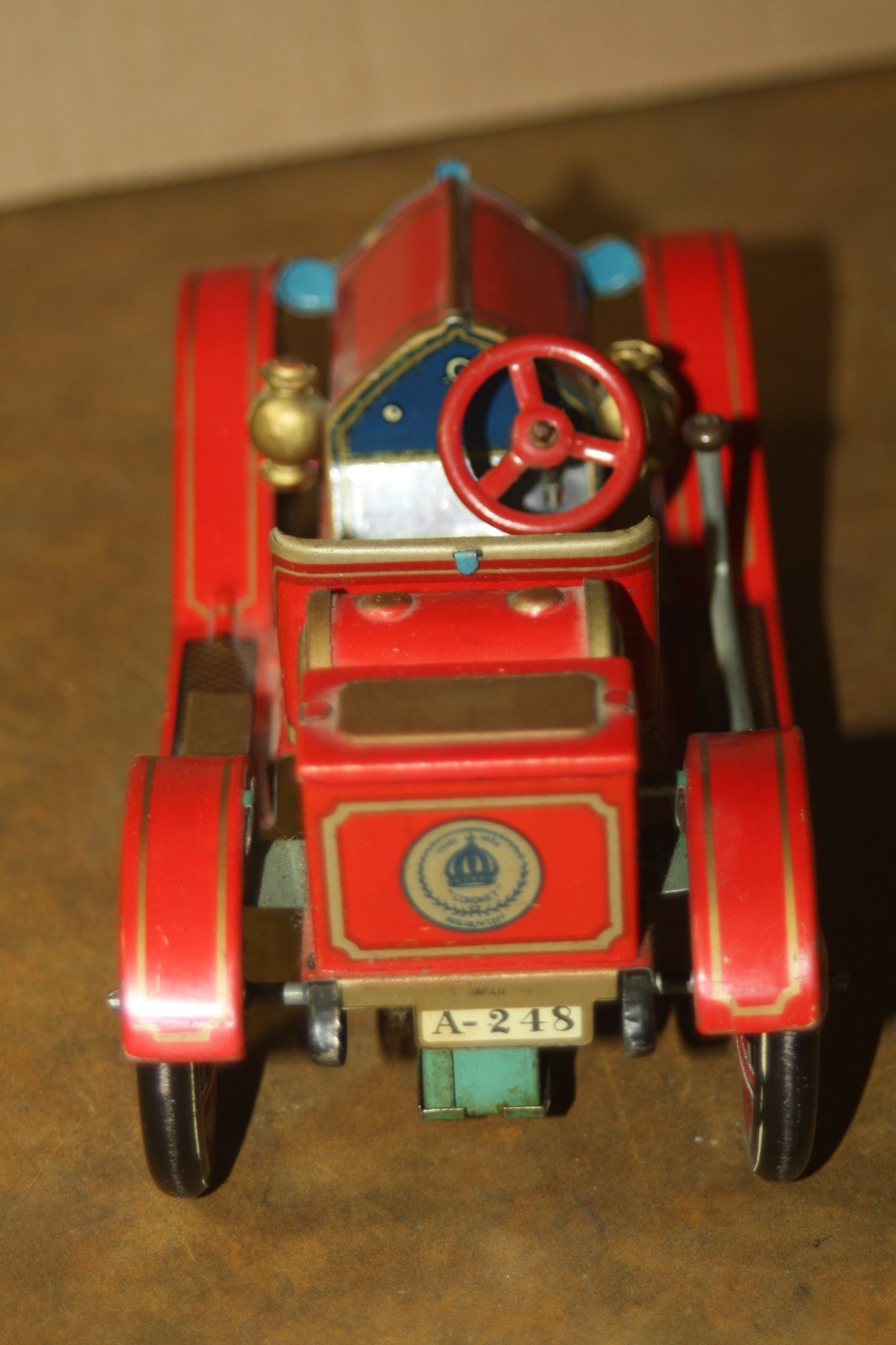 Vintage 1950’s – 60’s Red Coronet Tin Litho Lever Action Friction Car – Works