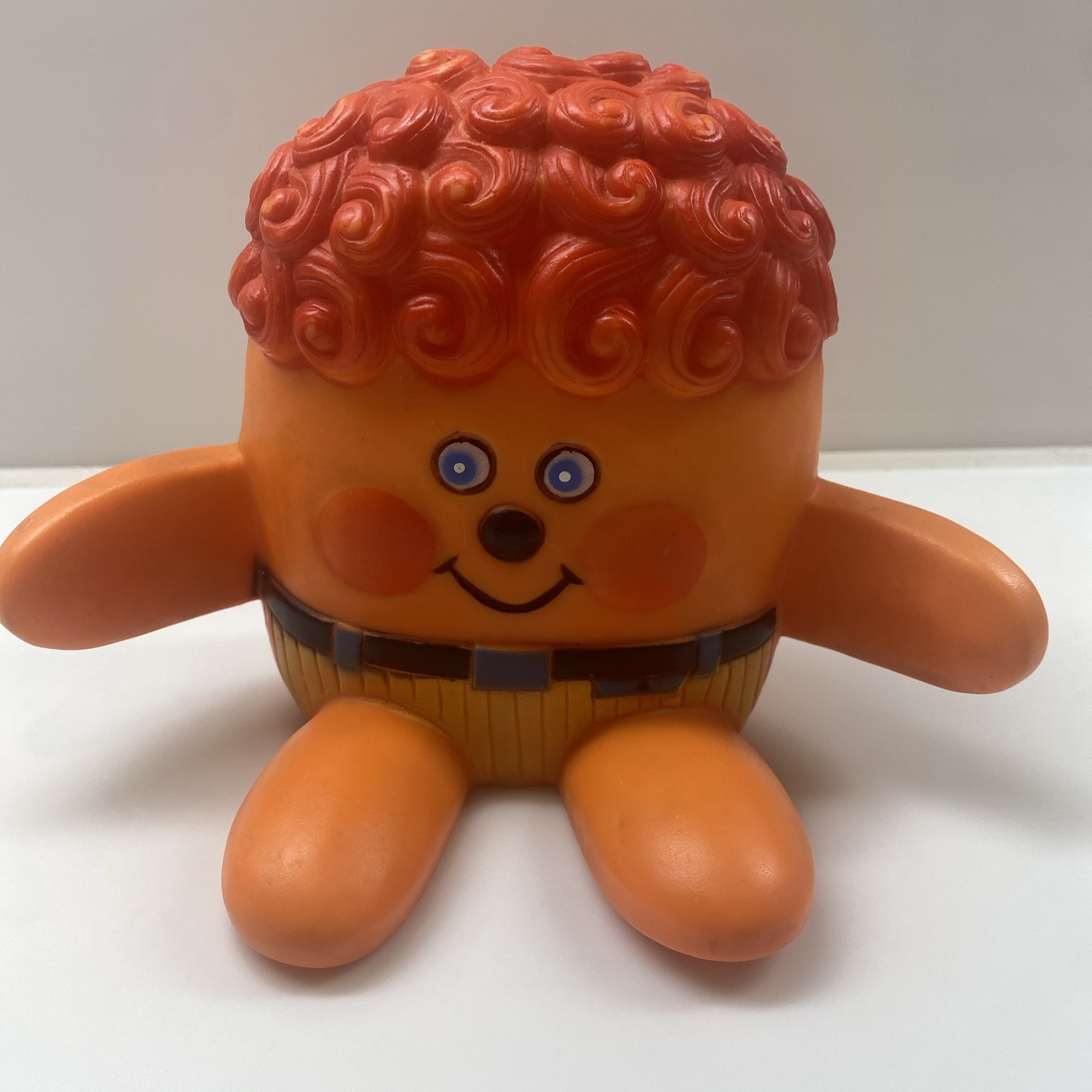 Vintage 2.5” Orange Tommee Tippee Curly Hair Character Squeaky Sitting 1960s Toy