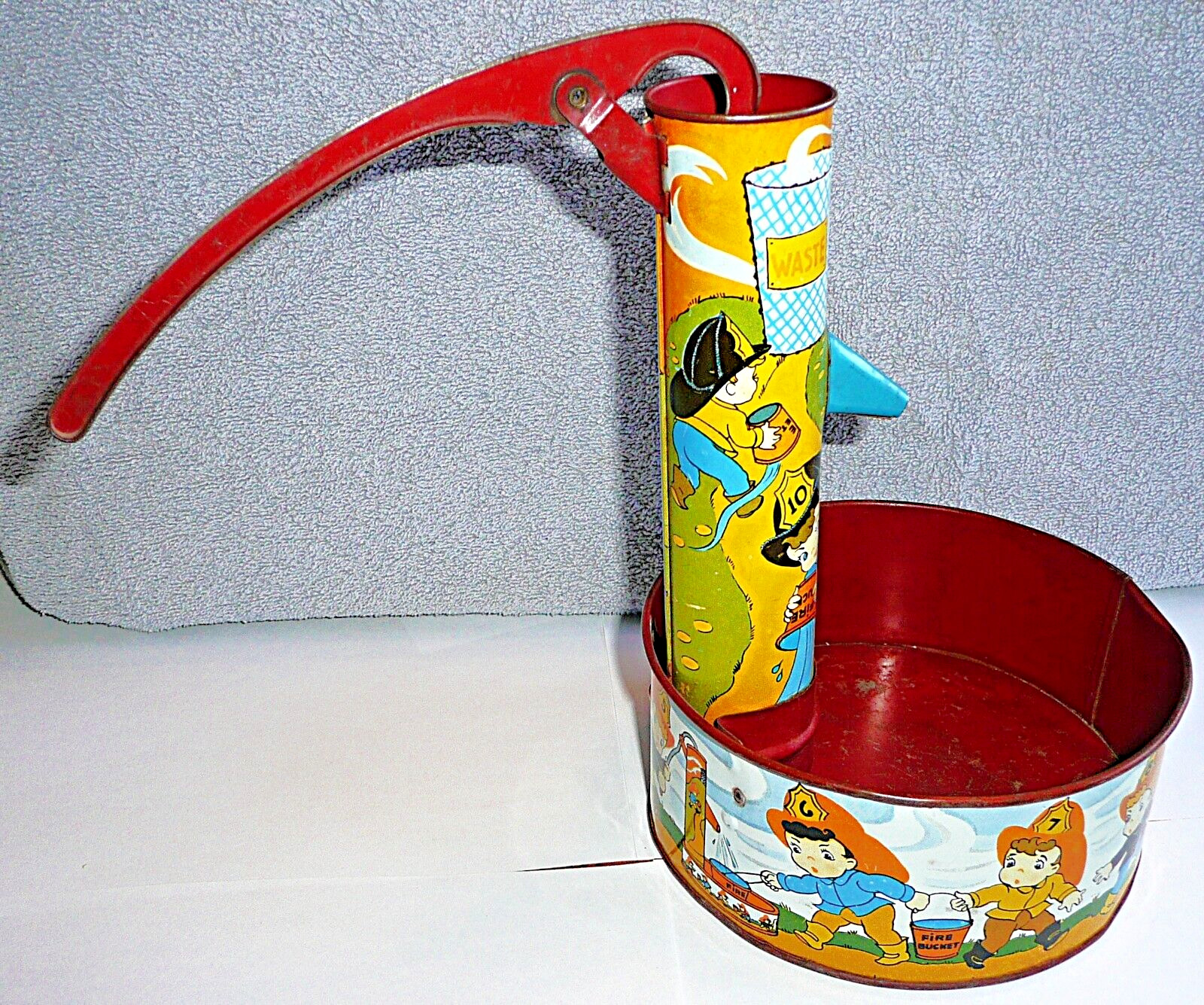 Vintage Ohio Art Fireman Tin Litho Water Pump Sand Toy