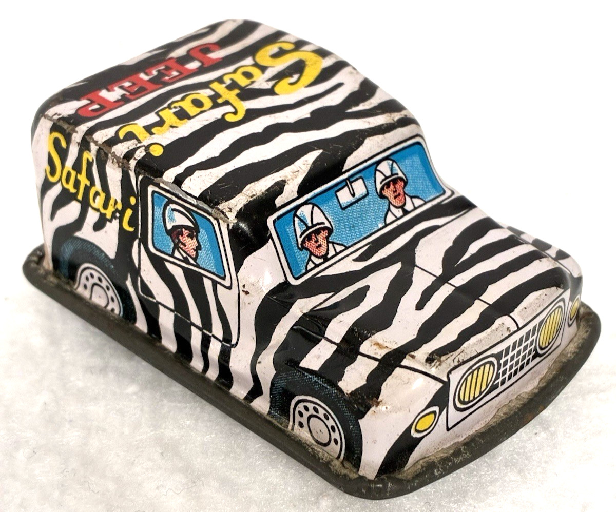 VINTAGE JAPAN TIN TOY SAFARI JEEP,ZEBRA MOTIF,RANGE ROVER?TOYOTA?GIFT!FRICTION:)