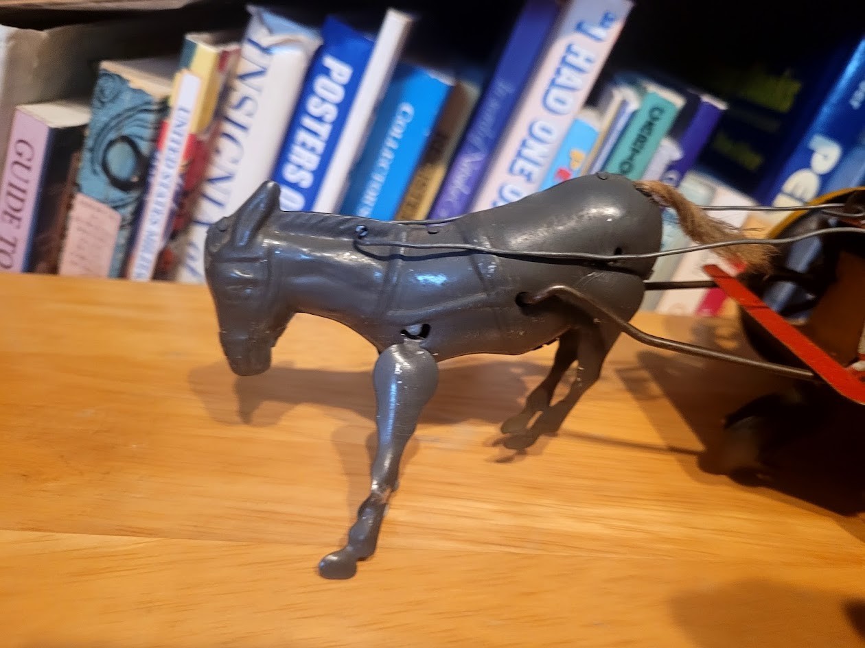 NICE VINTAGE 1920’S STRAUSS WIND UP TIN JENNY THE BALKY MULE with CLOWN